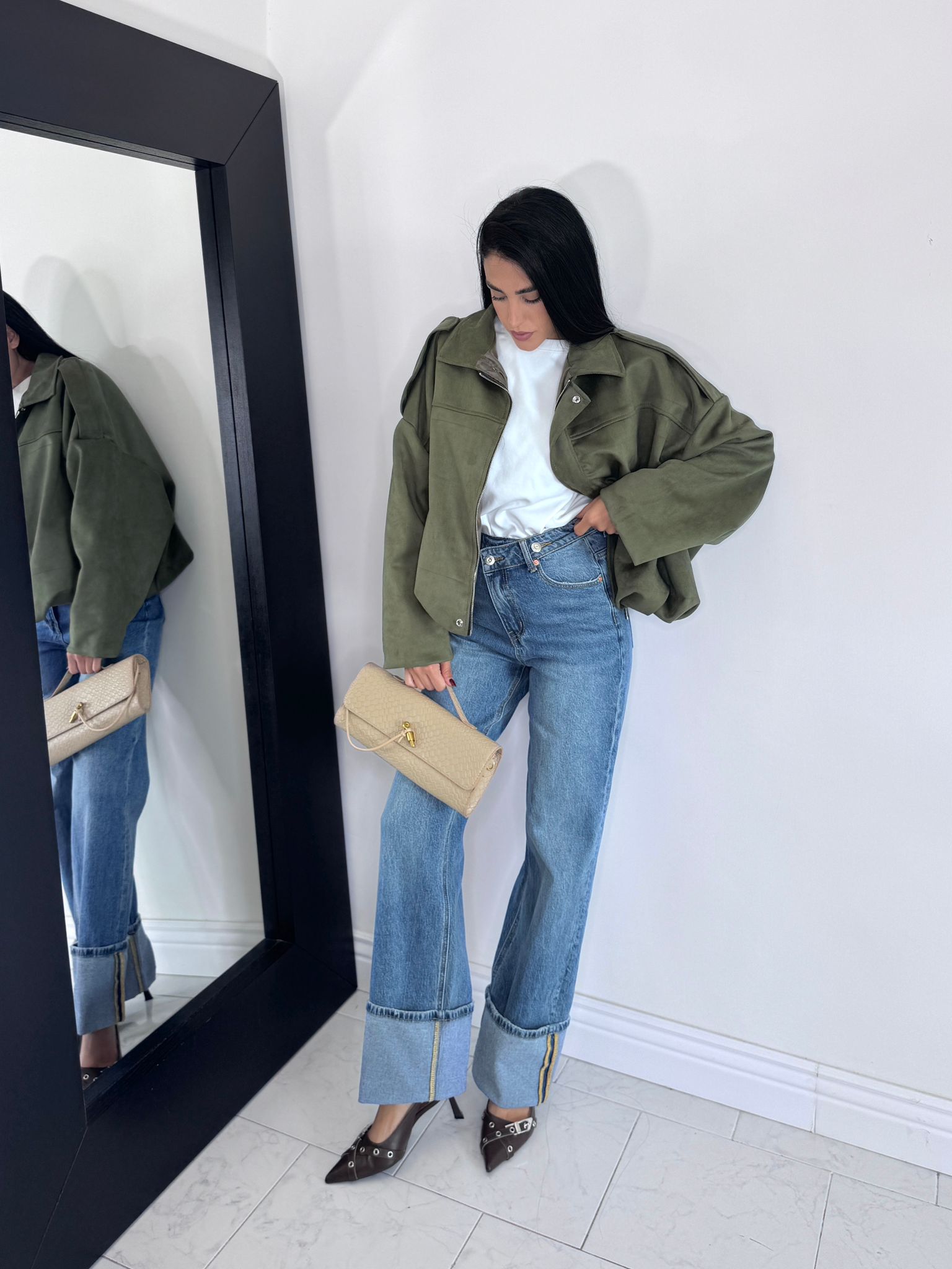 Jeans tendenza con piegone